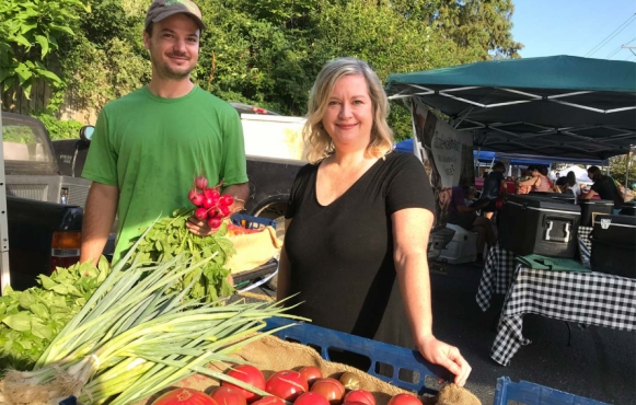 Sherry Hurley, chef and owner of Farm to Fork Catering and Cafe, sources locally at the Bardstown Road Farmers’ Market from vendors like farmer Parker Silliman of Parker’s Patch